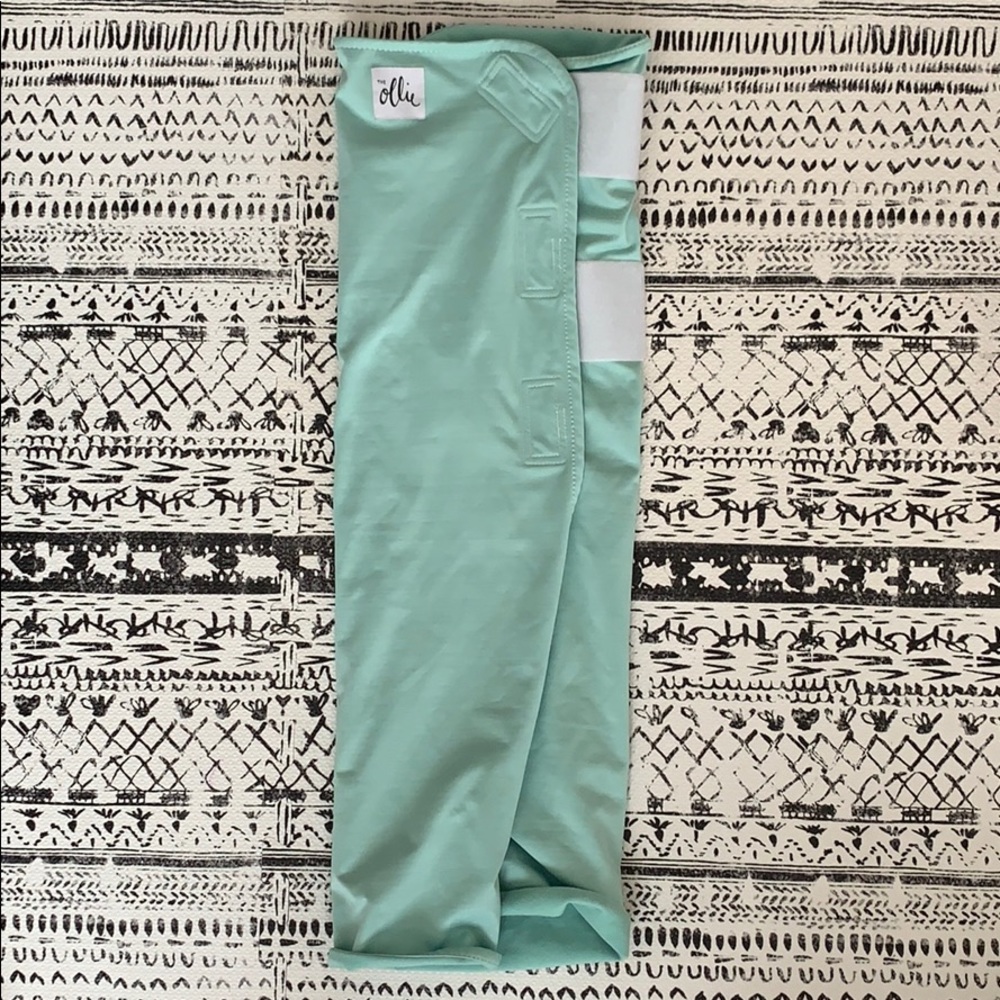 The Ollie Swaddle in Meadow (mint green color)